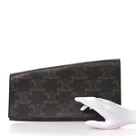 Triomphe Canvas Asymmetric Clutch Tan