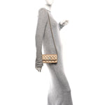 Iridescent Caviar Quilted Camellia Phone Holder With Chain Beige
