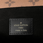 Reverse Monogram Pochette Metis