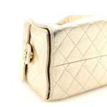 Metallic Caviar Quilted Small Chanel 25 Handbag Gold