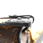 Reverse Monogram Trunk Clutch