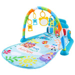 Colorful baby play gym with toys on a white background