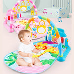 Baby playing on a colorful activity gym with various toys and music notes in the background.