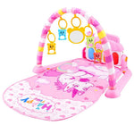 Pink baby play gym with toys on a white background