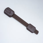 Brown leather belt with plastic buckle on a white background