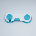 Blue and white fidget spinner on a light gray background