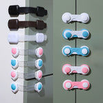 Colorful cabinet locks on a gray surface