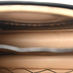 Reverse Monogram Trunk Clutch