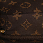 Calfskin Monogram Embossed Utility Crossbody Black
