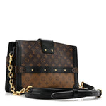 Reverse Monogram Trunk Clutch
