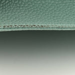 Caviar Quilted Boy Wallet On Chain WOC Light Blue