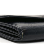 Lambskin Embossed Camellia Large Gusset Flap Wallet Black