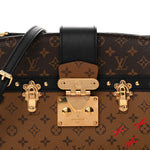 Reverse Monogram Trunk Clutch