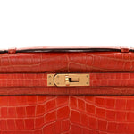 Shiny Porosus Crocodile Kelly Cut Pochette Orange Poppy