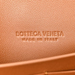 Suede Intrecciato Long Andiamo Top Handle Clutch Amber