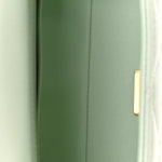 Caviar Quilted Retro Medium Twist Top Handle Clutch Light Green