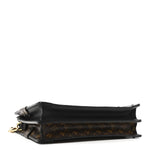 Reverse Monogram Trunk Clutch