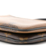 Reverse Monogram Giant Double Zip Pochette
