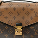 Reverse Monogram Pochette Metis