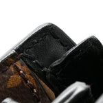Reverse Monogram Trunk Clutch