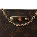 Monogram Eva Clutch NM