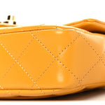Shiny Lambskin Quilted Golden Links Top Handle Flap Yellow