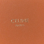 Triomphe Canvas Asymmetric Clutch Tan