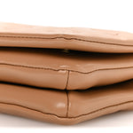Lambskin Embossed Monogram Pochette Coussin Camel
