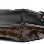 Reverse Monogram Trunk Clutch