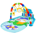Colorful baby play gym with toys on a white background