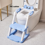 Children's potty training seat with blue cushion and step stool attached to a toilet.
