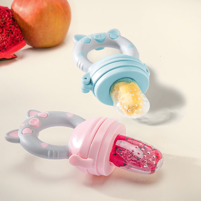 Two baby food feeders, one blue and one pink, with fruit inside on a light background.
